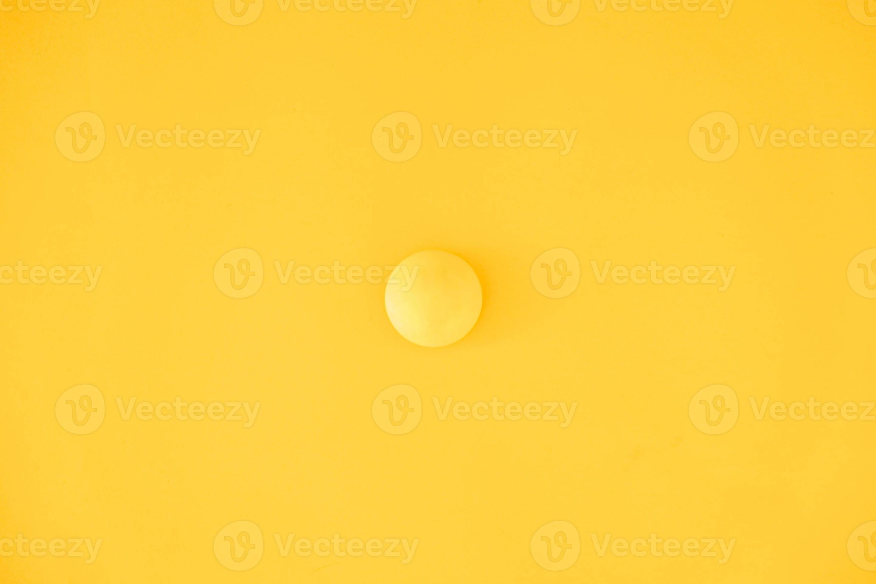Yellow ball on yellow background 4953300 Stock Photo at Vecteezy