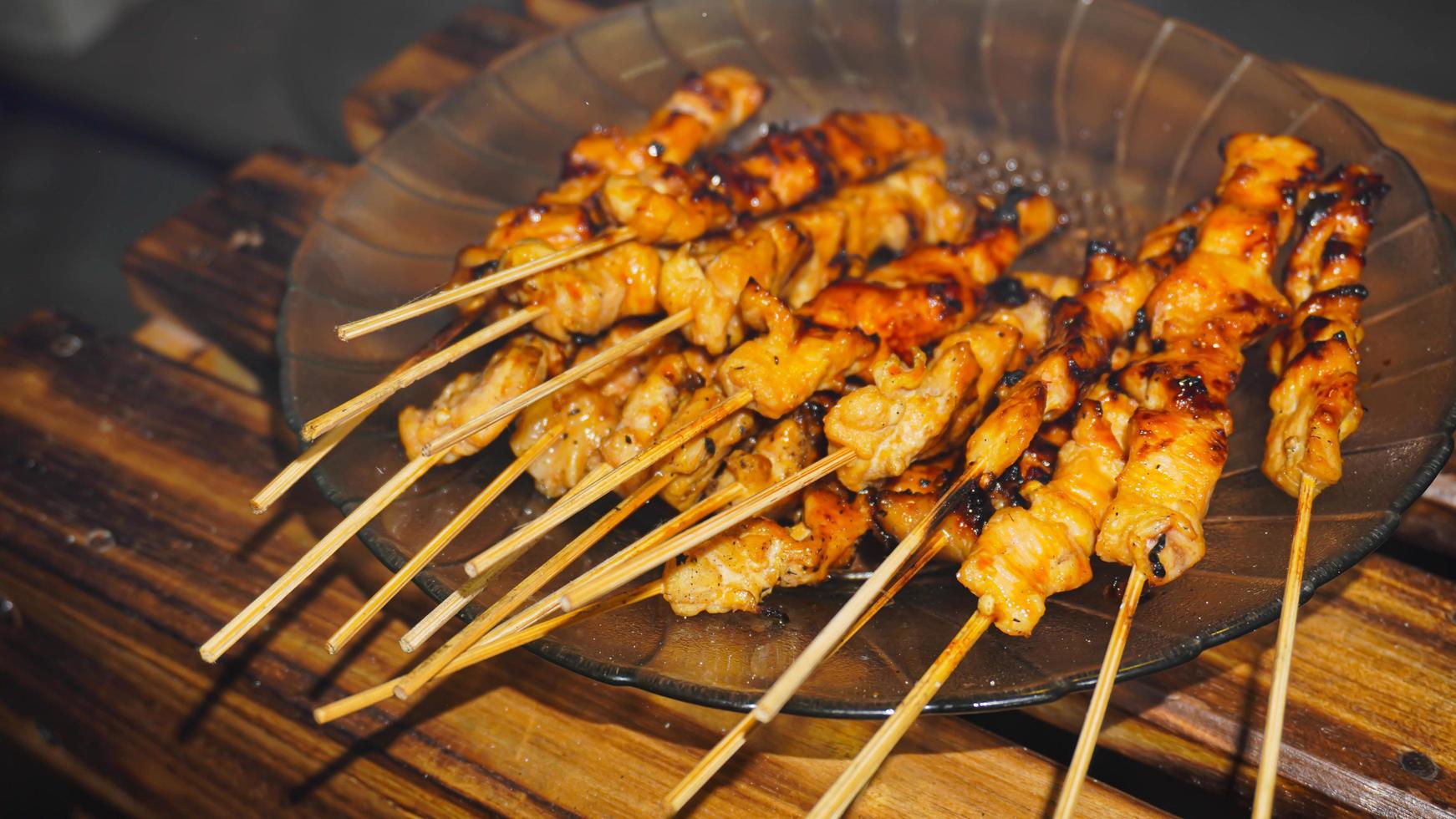 a few of satay on the plate photo