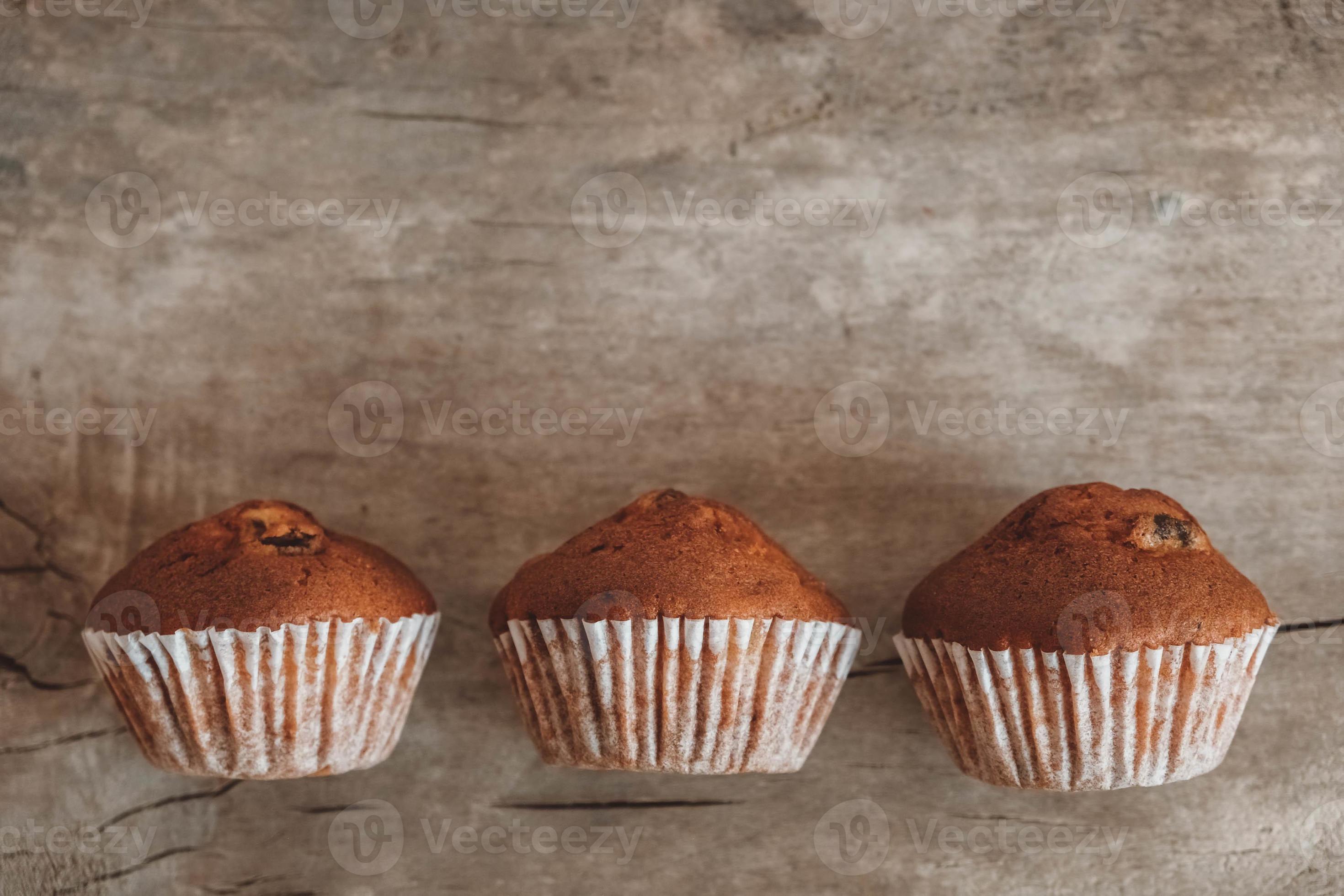 Chocolate cupcakes on wooden table background 4953500 Stock Photo at