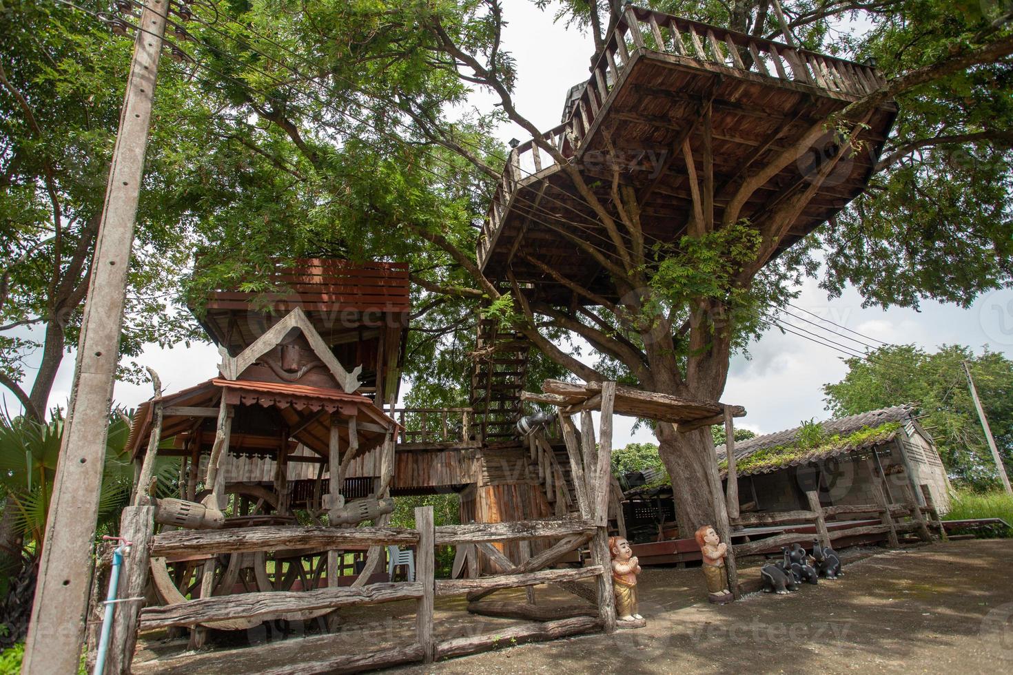 An old and dilapidated tree house that has been abandoned. photo