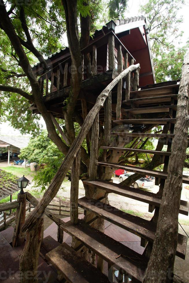 An old and dilapidated tree house that has been abandoned. photo