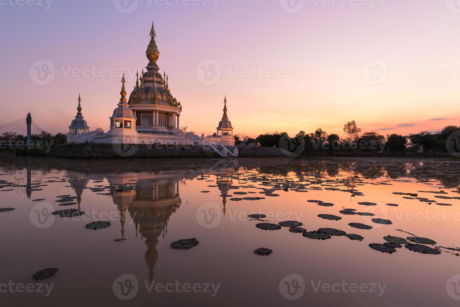 beautiful buddhist pagoda at dust photo