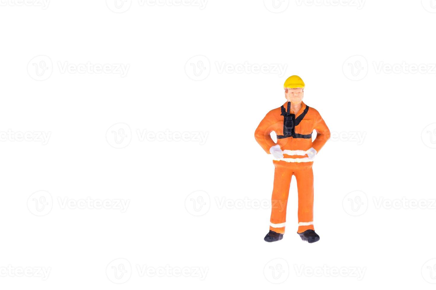 Close up of Miniature people in engineer and worker occupation isolate on white background. Elegant Design with copy space for placement your text, mock up for industrial and construction concept photo