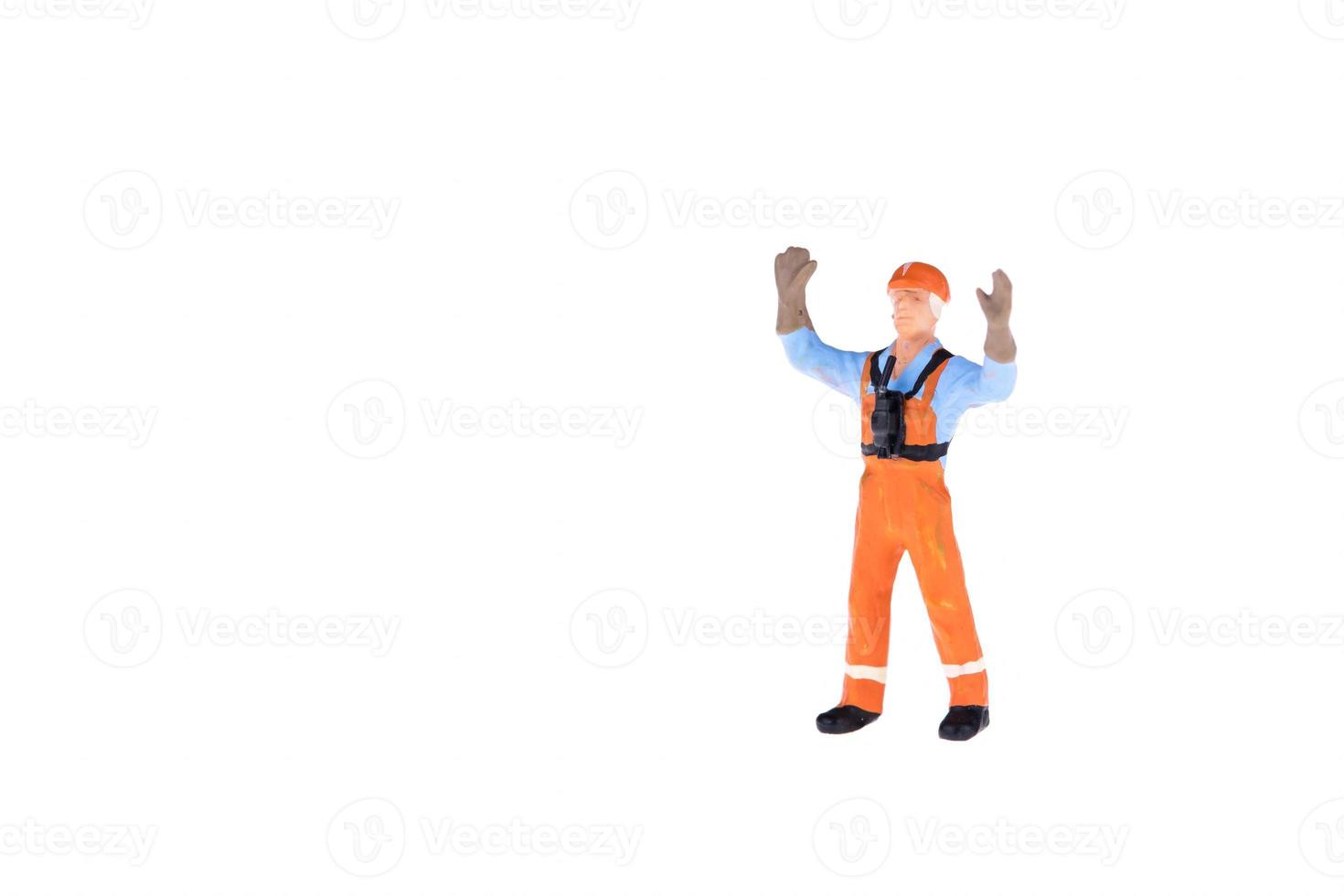 Close up of Miniature people in engineer and worker occupation isolate on white background. Elegant Design with copy space for placement your text, mock up for industrial and construction concept photo