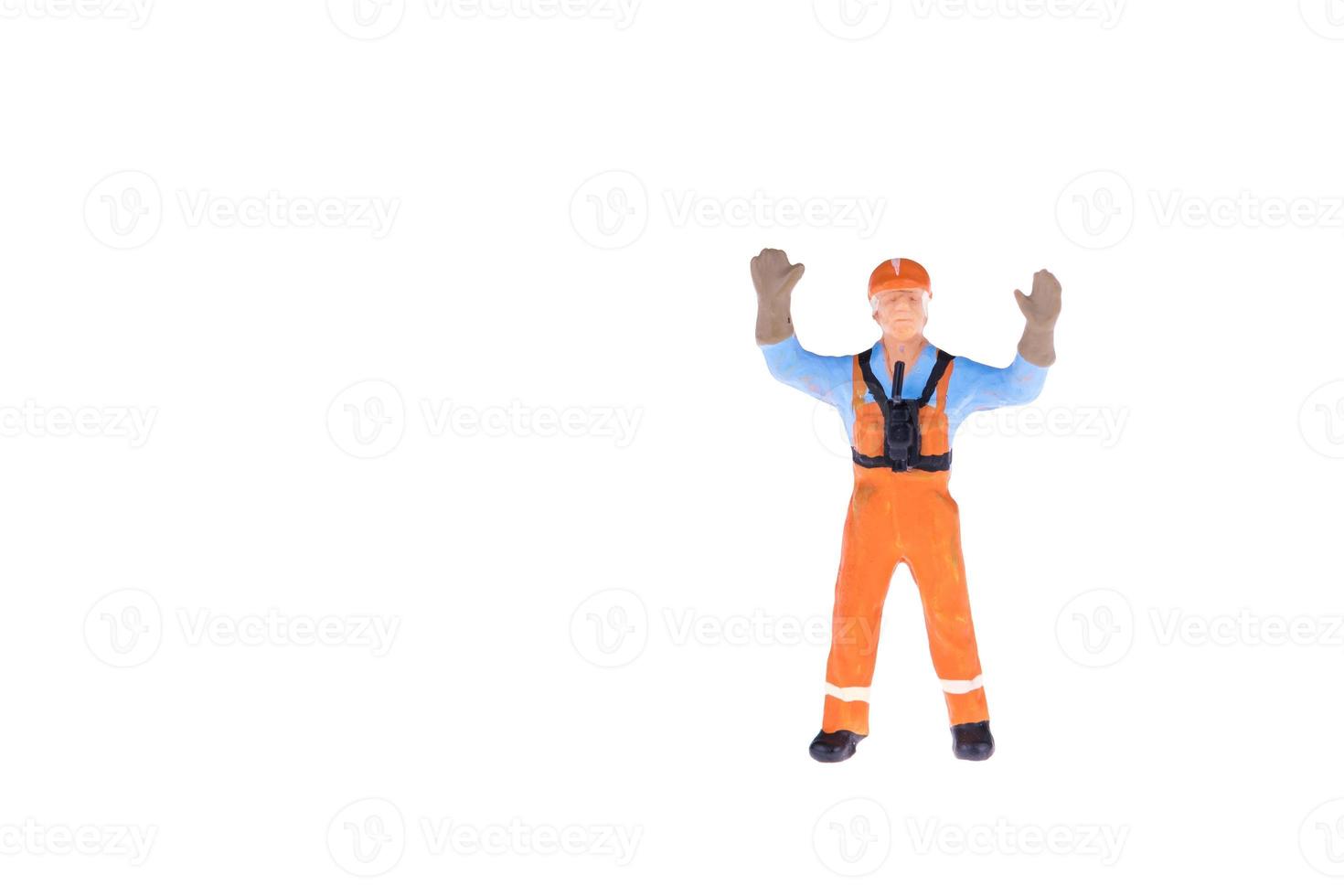 Close up of Miniature people in engineer and worker occupation isolate on white background. Elegant Design with copy space for placement your text, mock up for industrial and construction concept photo