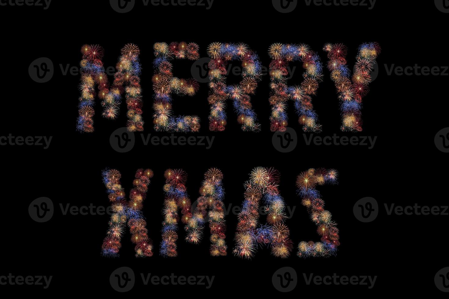 Colour fireworks light up forming a MERRY CHRISTMAS word on black background with dazzling display. Event and celebrations background concept photo