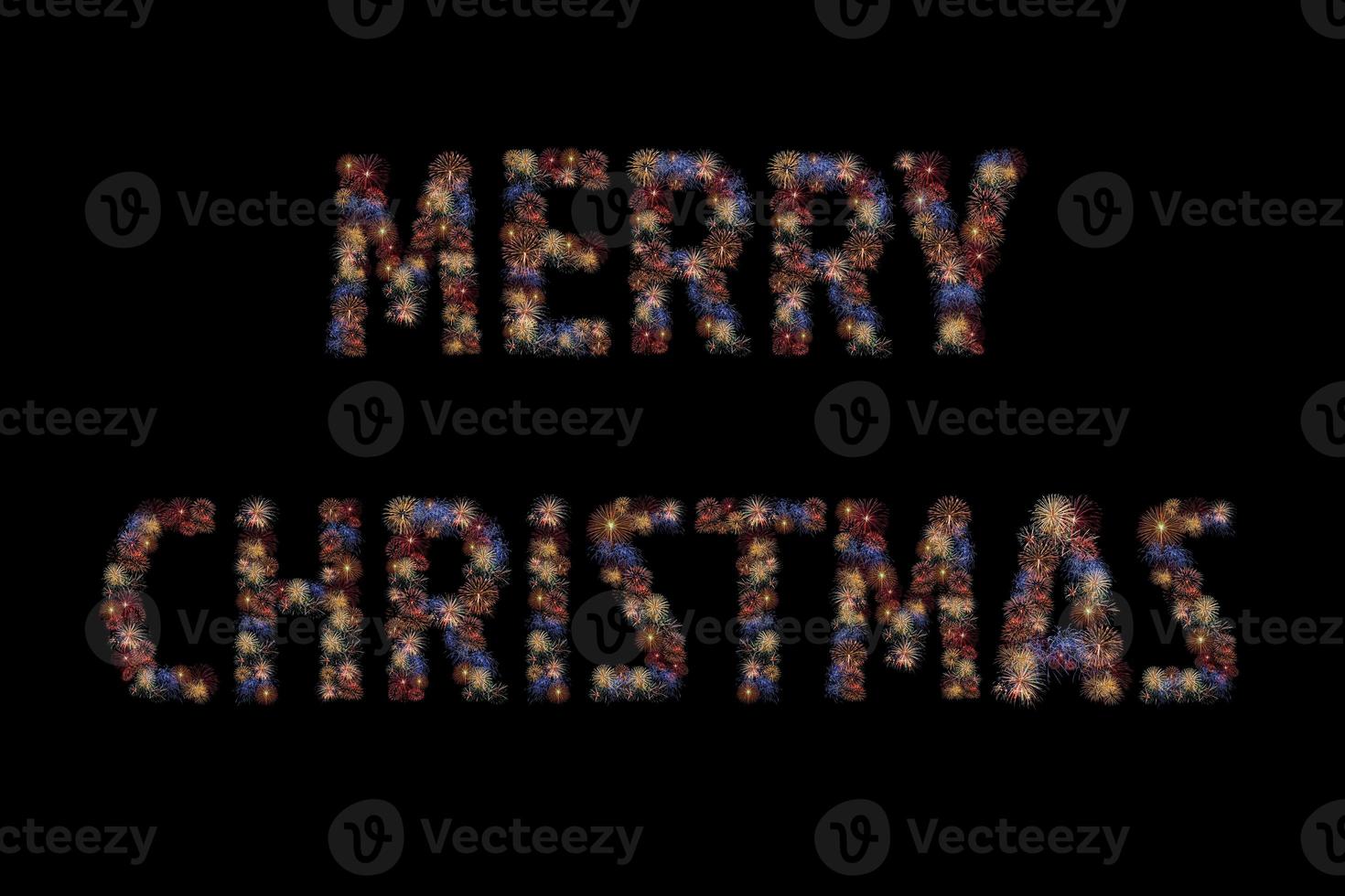 Colour fireworks light up forming a MERRY CHRISTMAS word on black background with dazzling display. Event and celebrations background concept photo
