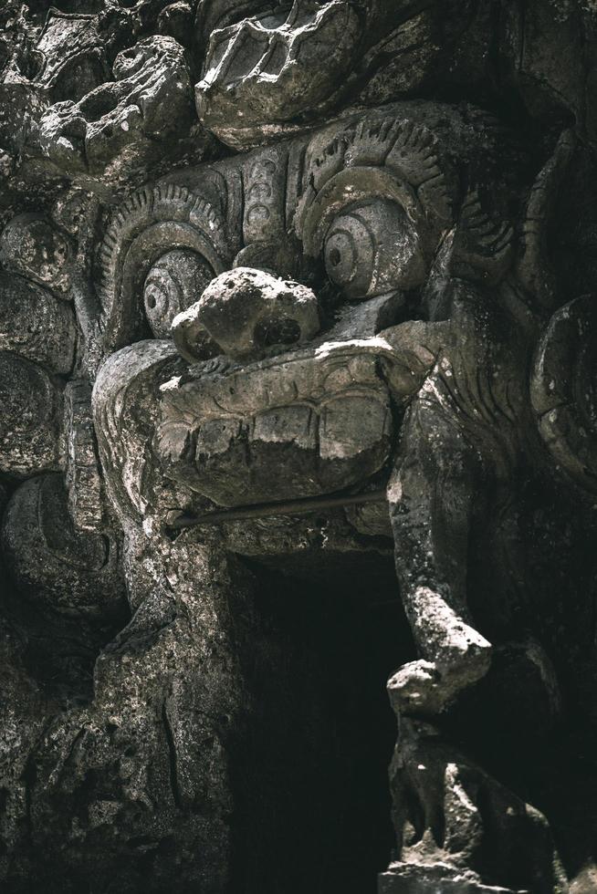 Temple door sculpted in rock photo