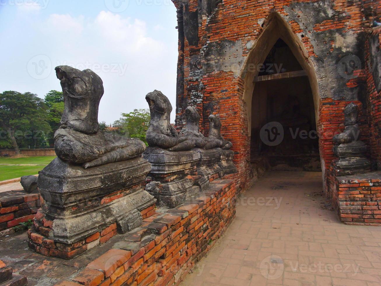 Ancient Buddha statue in Wat Chaiwatthanaram is a Buddhist temple in the city of Ayutthaya Historical Park. photo