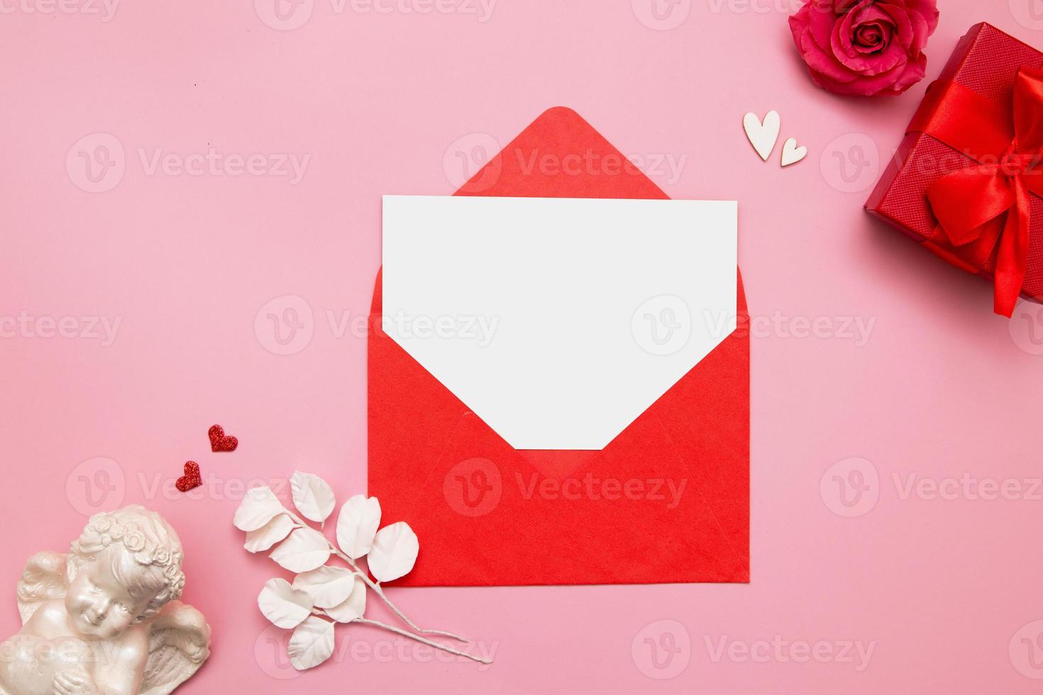 Flat lay envelope with blank mock up sheet for Valentine's Day photo