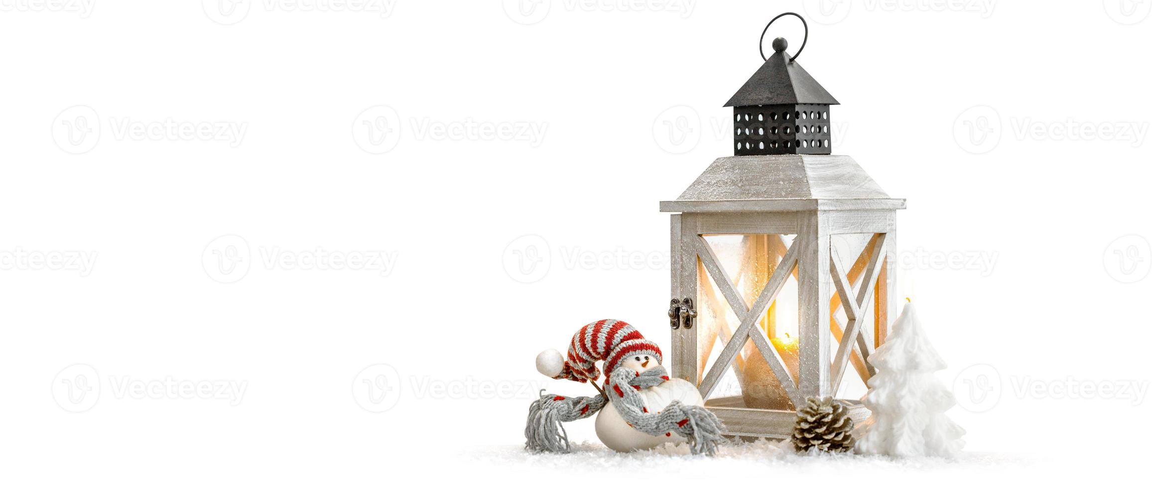 Winter background of snowed lantern and Christmas decoration. photo