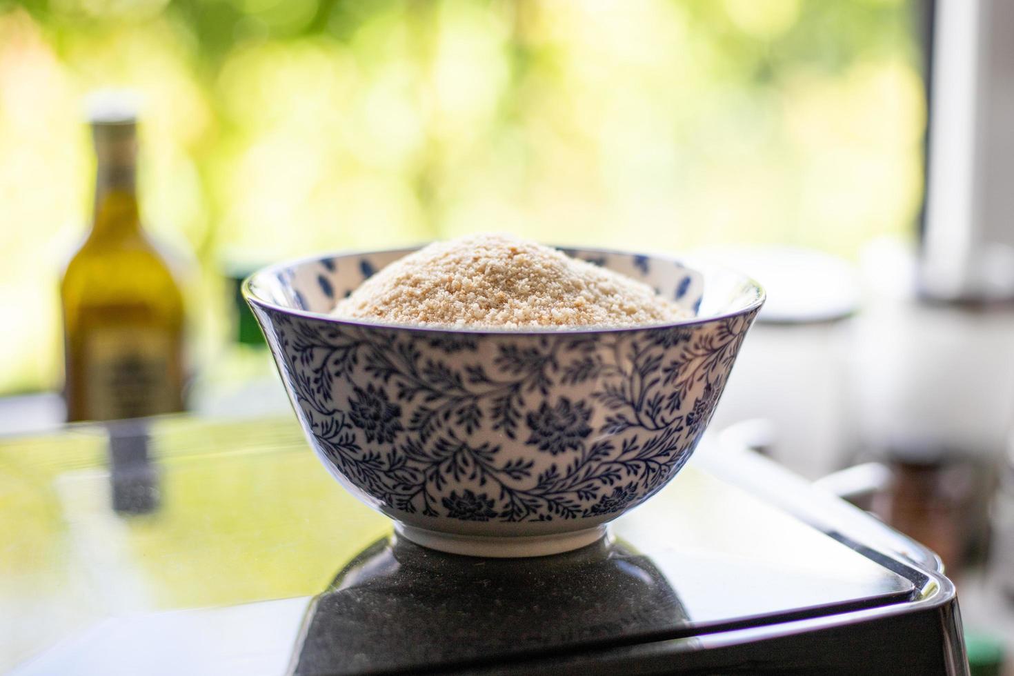 Breadcrumbs in a bowl ready for breading. photo