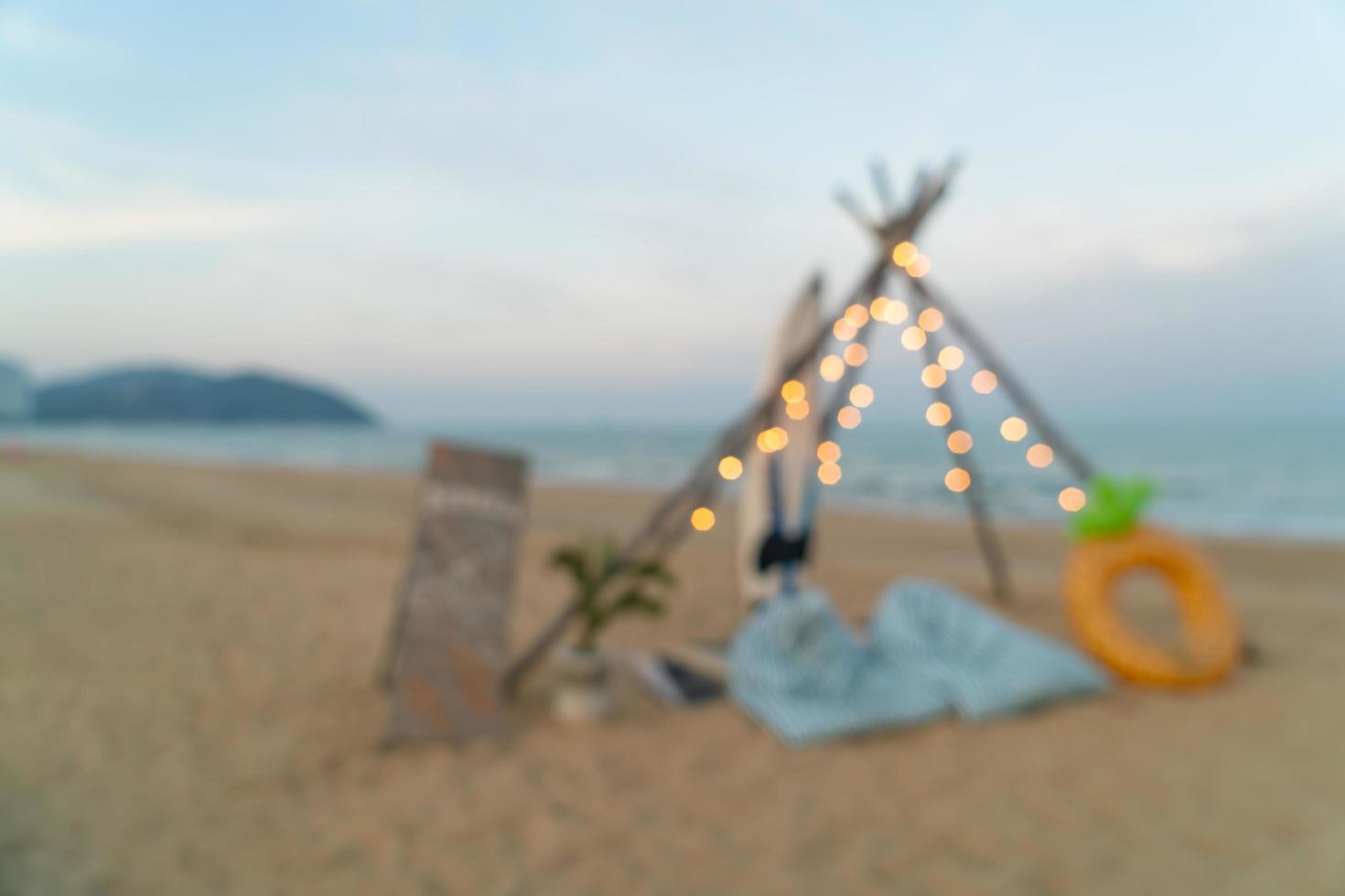 abstract blur camping yard on beach for background photo