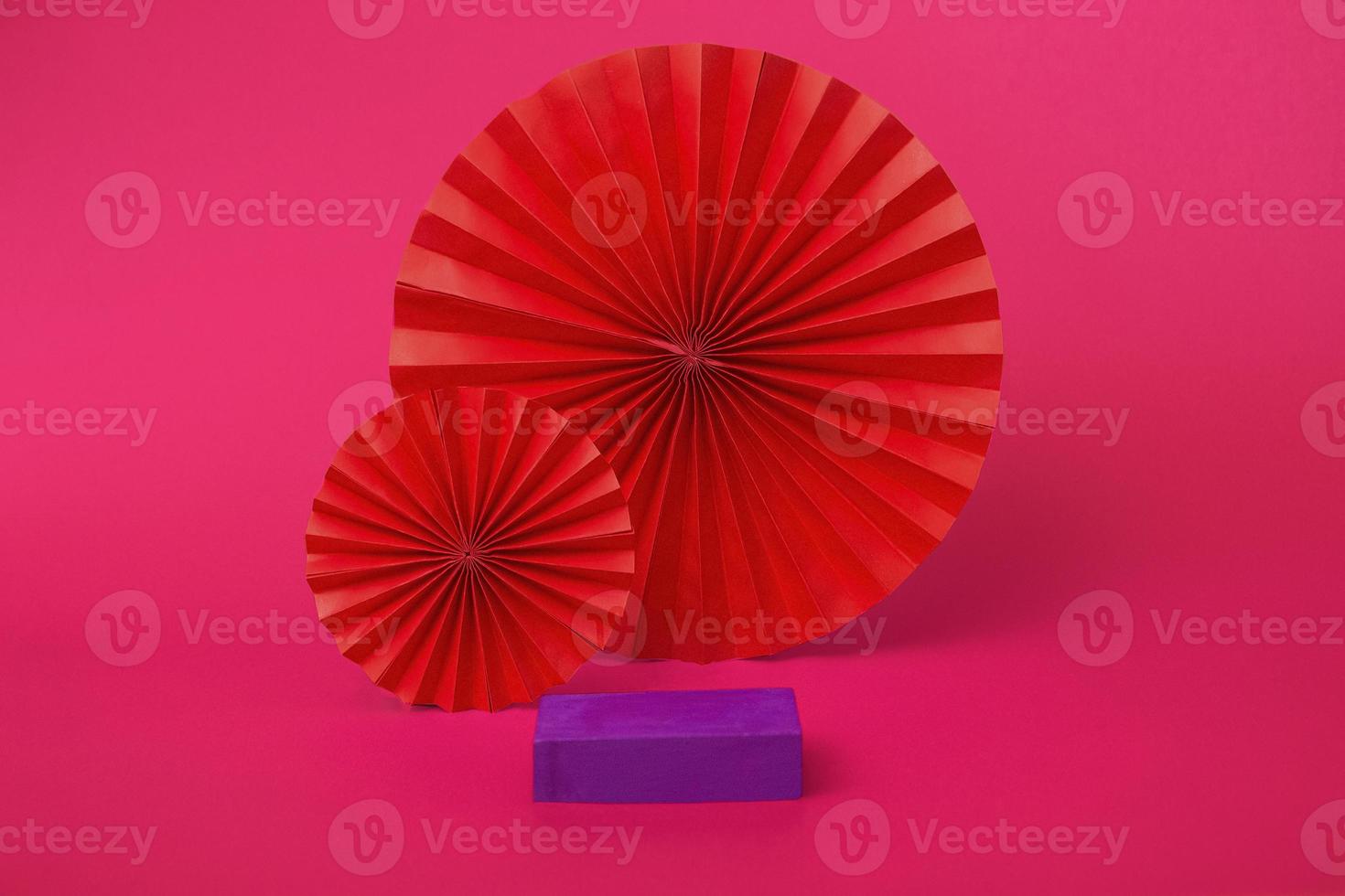 A very peri geometric podium to showcase cosmetic products on a pink background. Showcase abstract background closeup photo