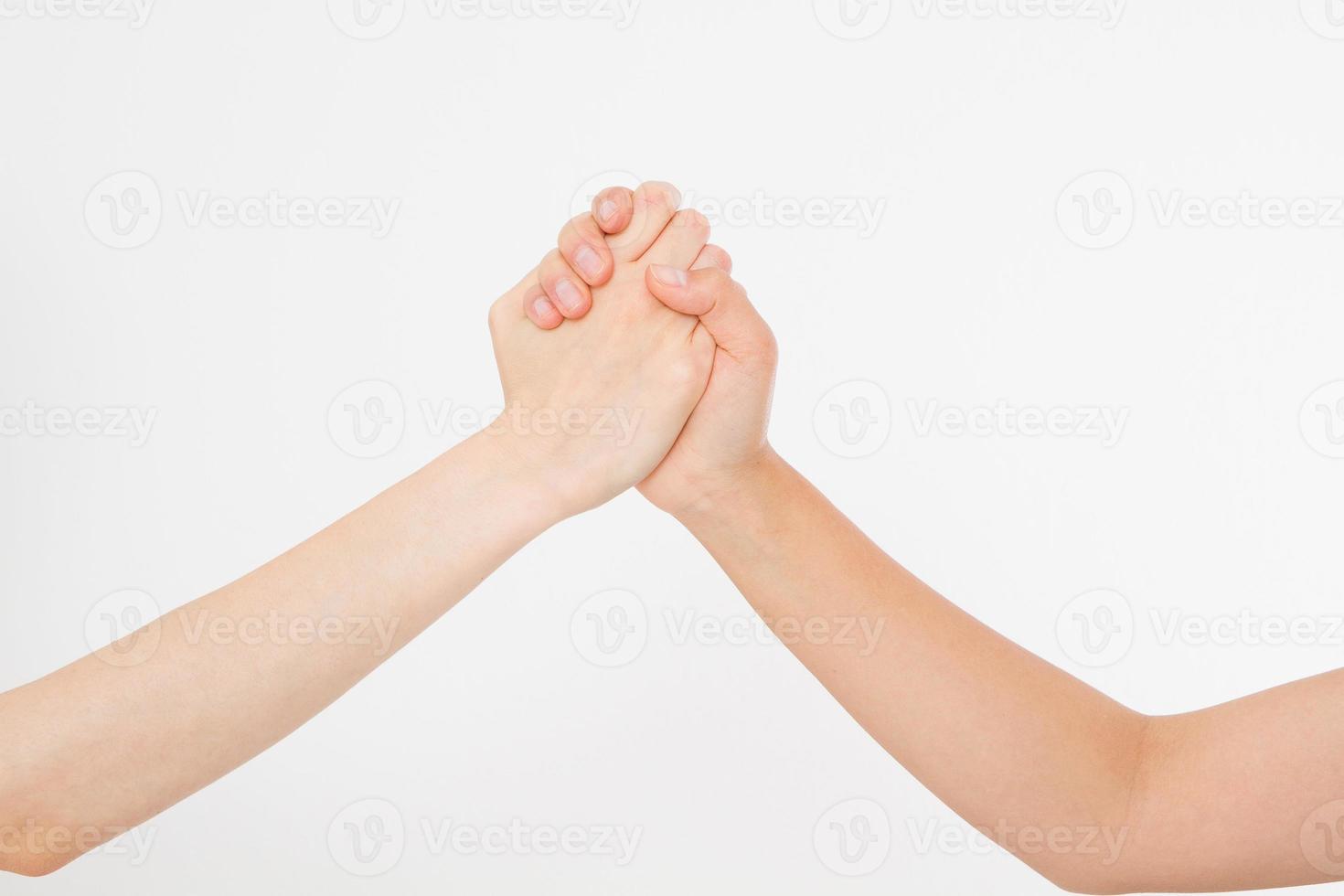Two hands isolated. Helping hand to a friend. Copy space. Rescue or helping gesture of arms. Abstract confrontation photo