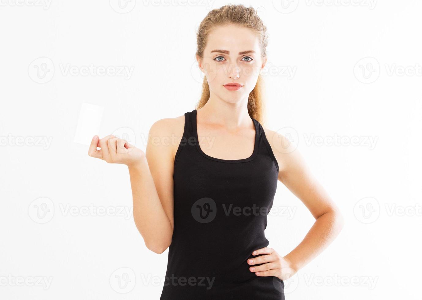 Lady in tank top holding business card - close up isolated on white background copy space, teen woman hold business card mockup photo