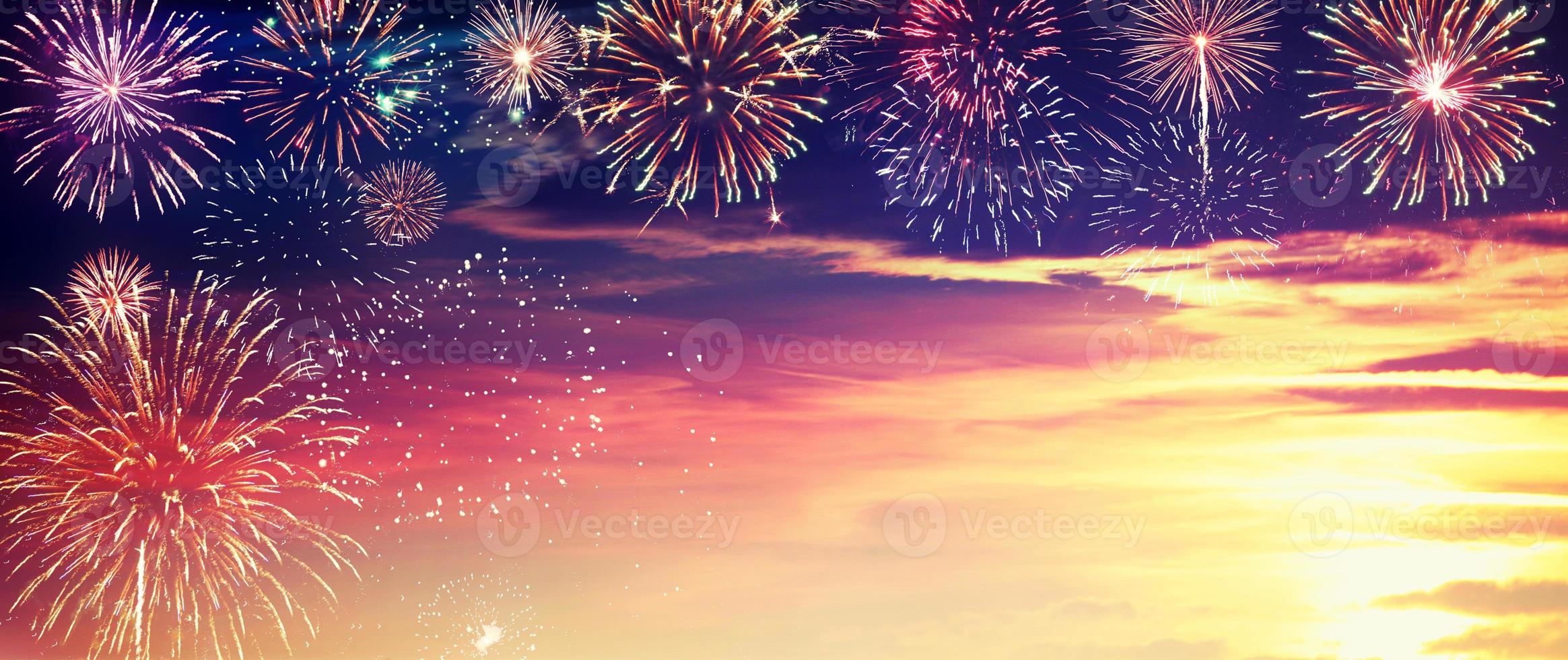 Abstract colored firework on dark sky. Celebration and anniversary concept photo