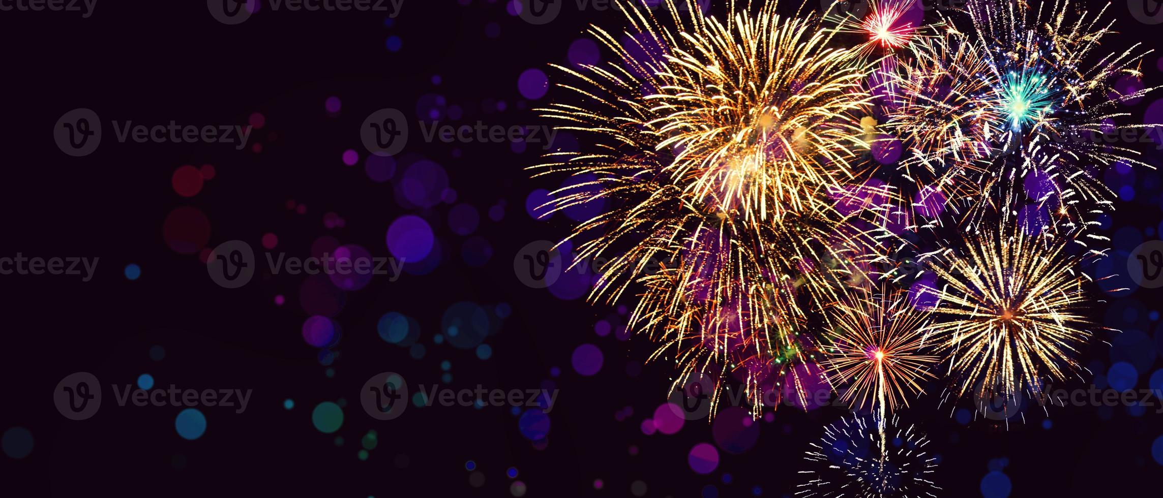 Abstract colored firework on dark sky. Celebration and anniversary concept photo