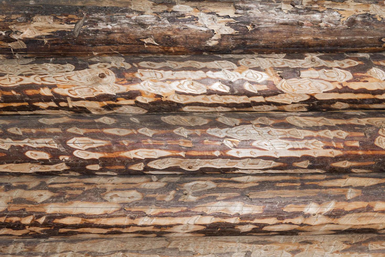 Wooden logs at the intersection in a rural house. photo