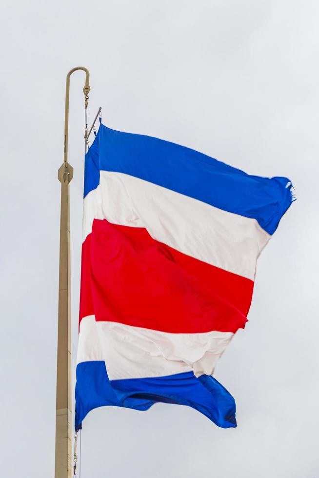 Flag of Costa Rica cloudy white sky Costa Rican flag. photo