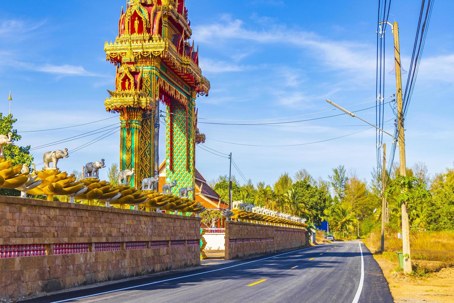 Entrance gate Wat Phadung Tham Phothi temple Khao Lak Thailand. photo