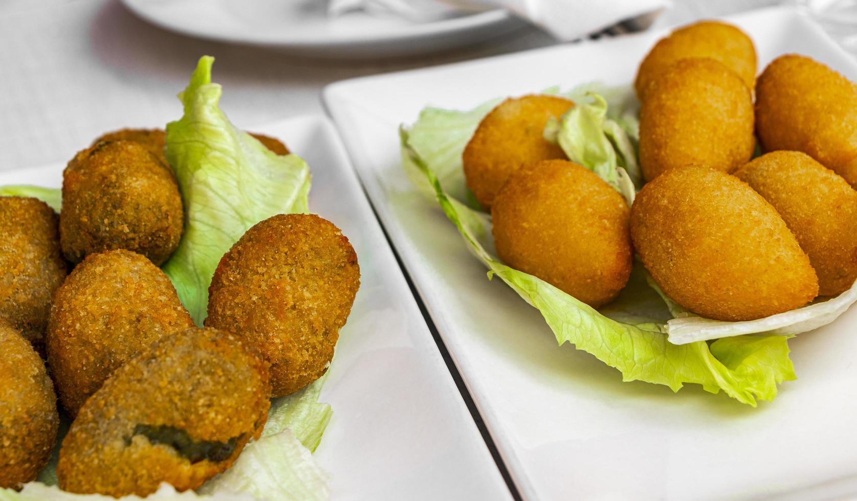 Round fish fingers with spinach filling. Food on Mallorca. photo