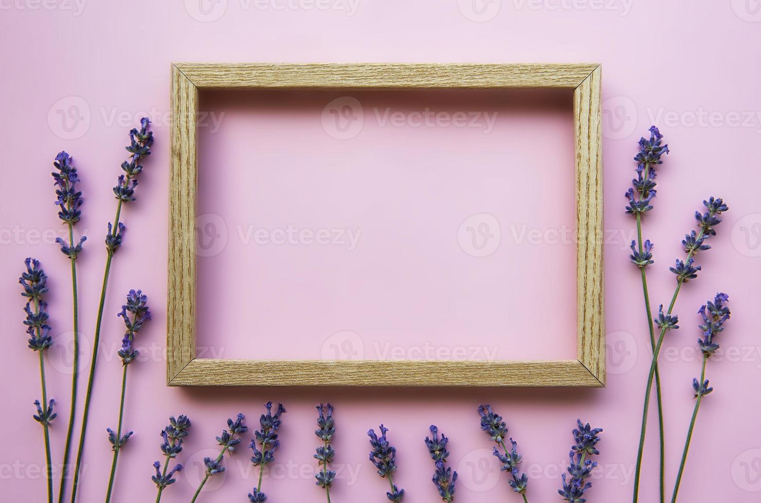 Wooden frame with beautiful flowers of fragrant lavender photo