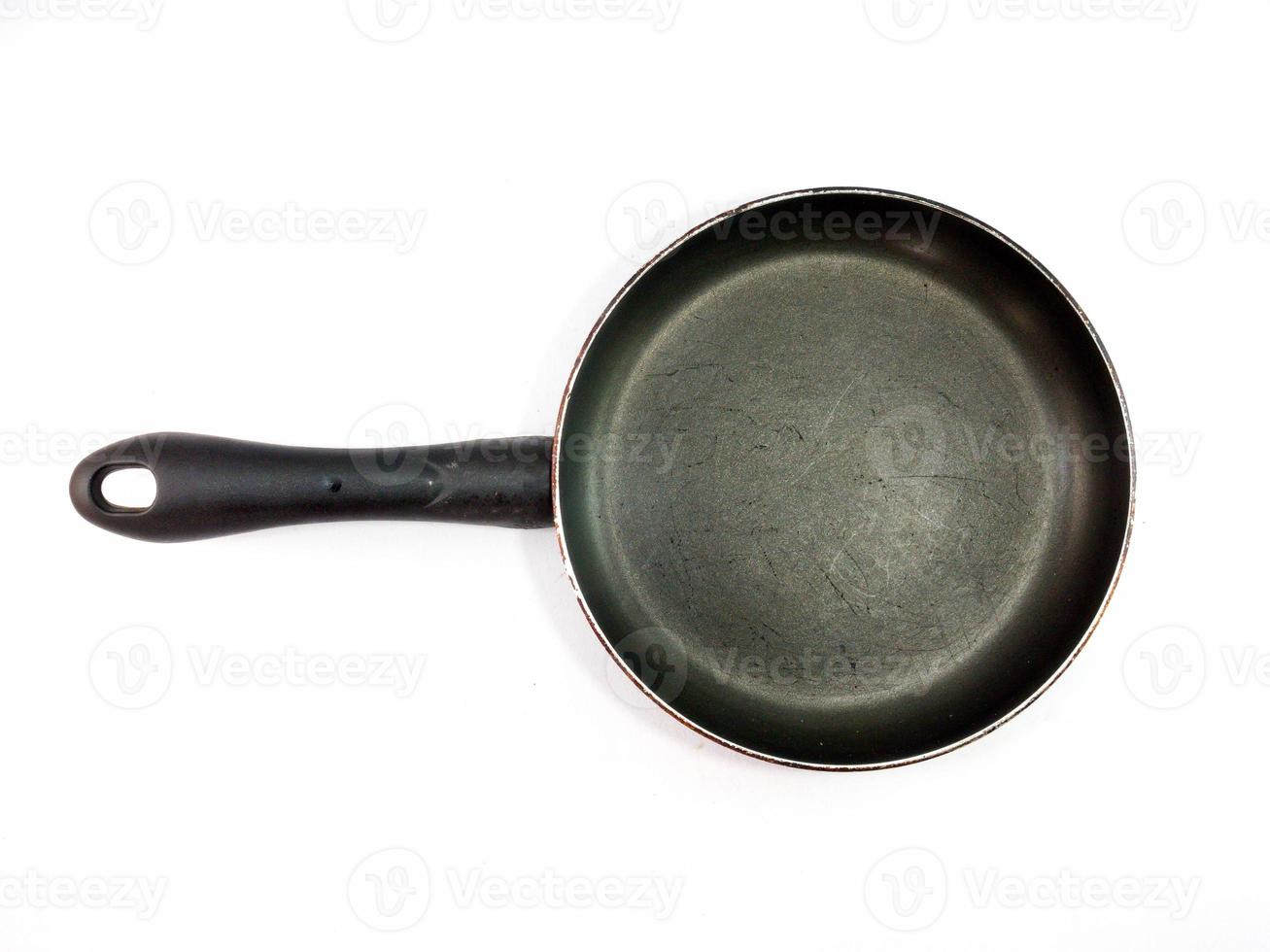 Top black pan on a white background. photo