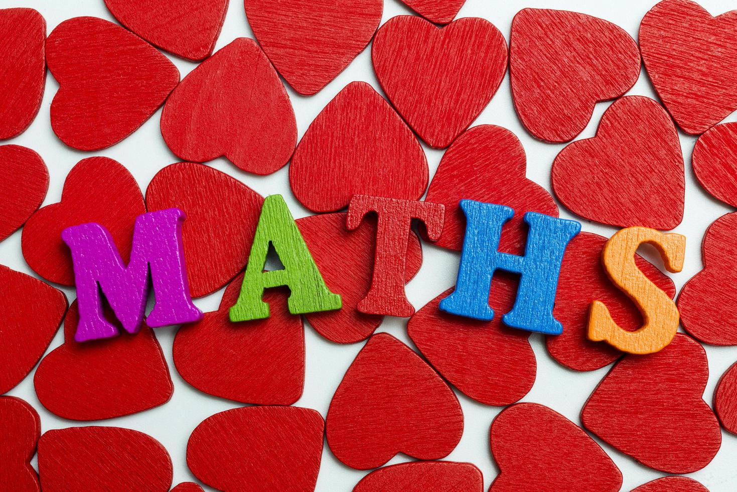 The word mathematics are posted on the hearts. photo