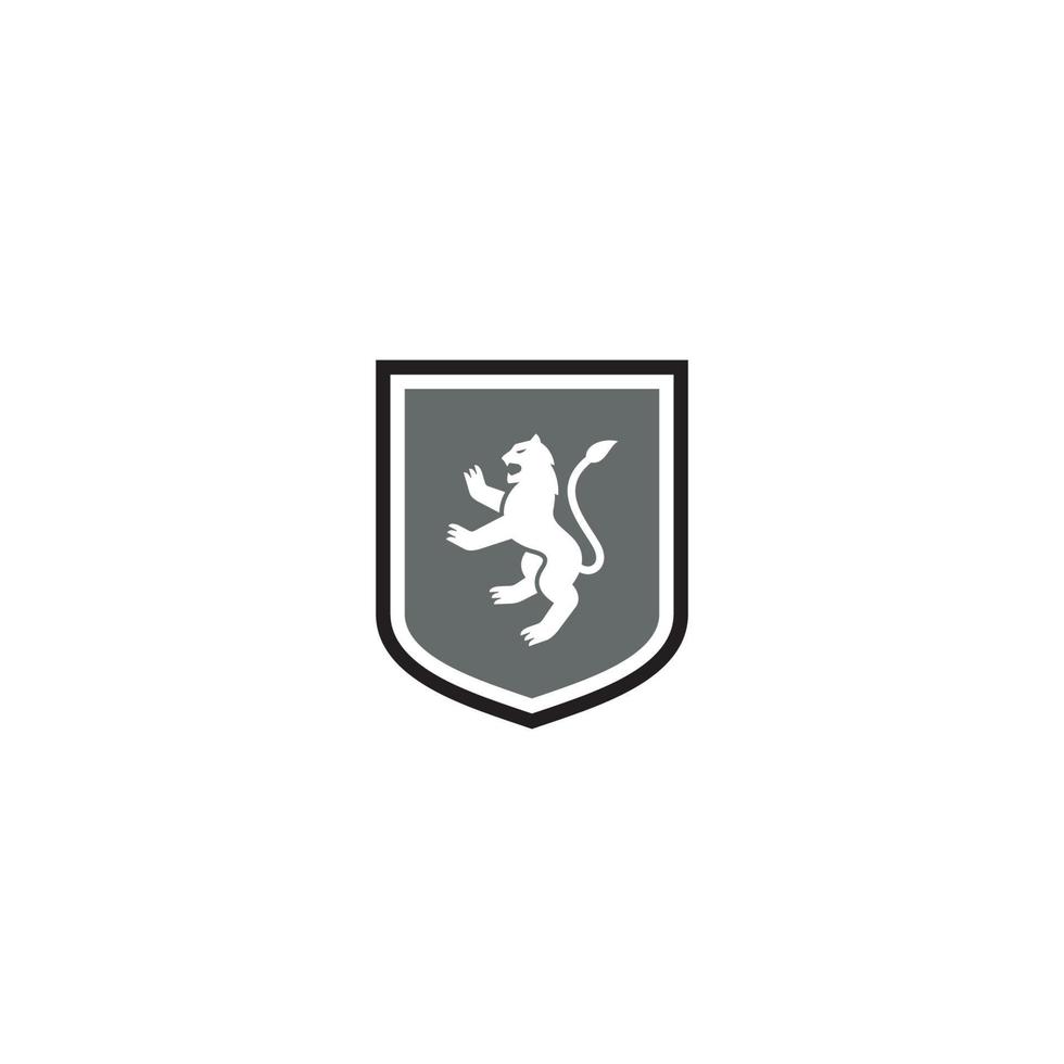 escudo y león logo o diseño de icono vector