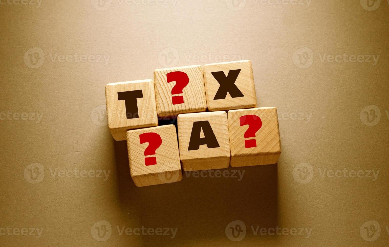 Tax Word with Wooden Cubes photo