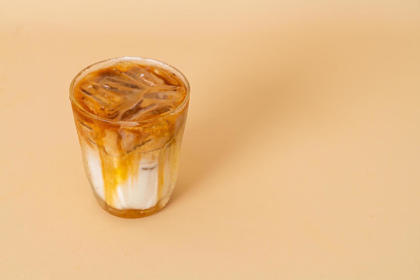 caramel macchiato coffee in glass photo