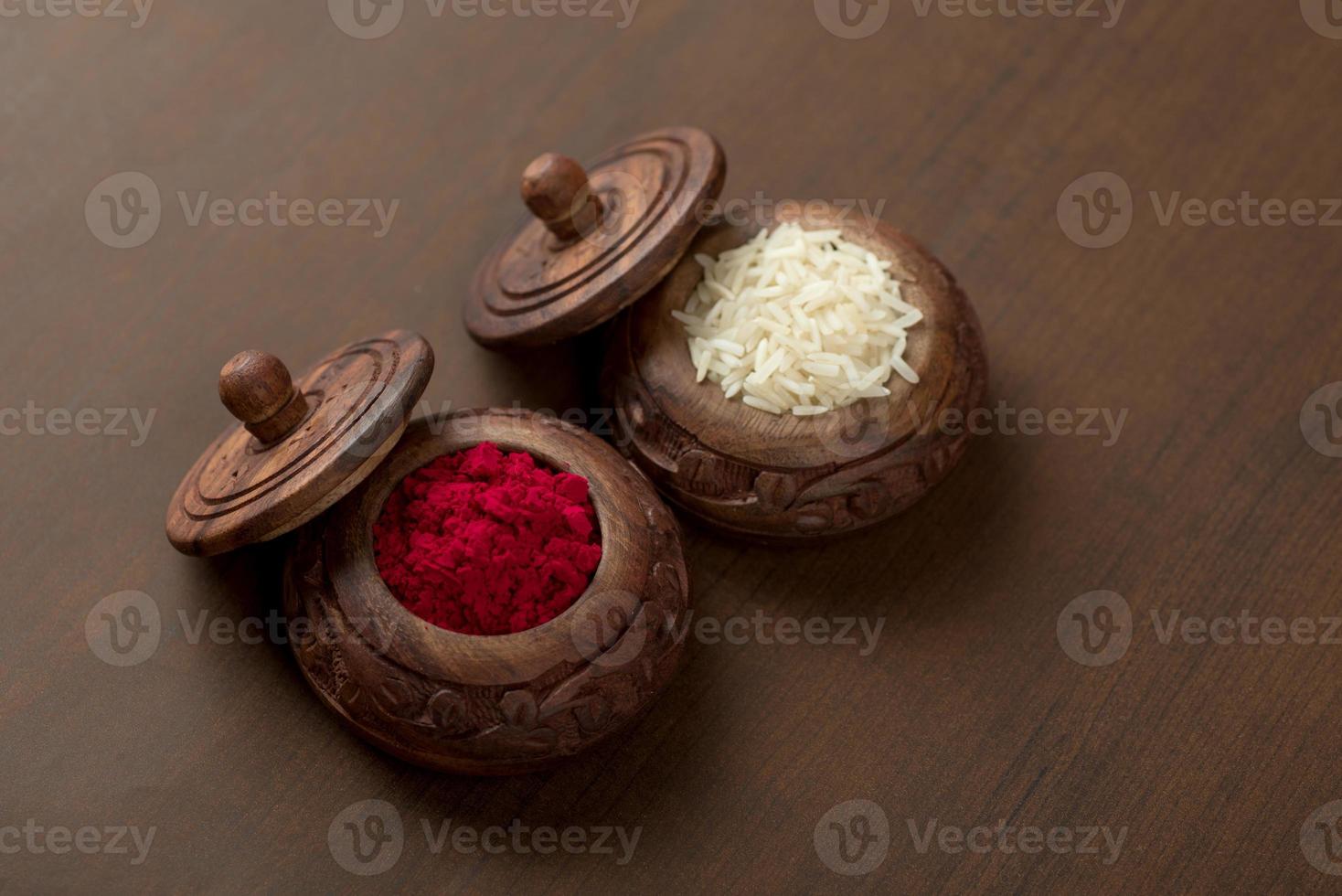 Kumkum and rice grain container. Natural color powders are used while worshipping God and an at auspicious occasions. photo
