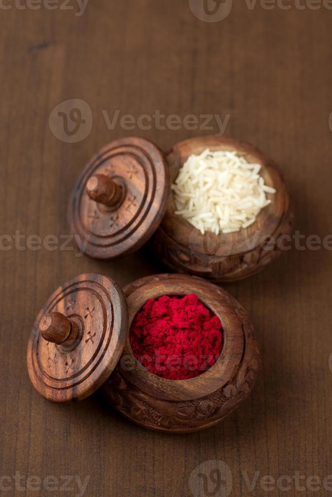 Kumkum and rice grain container. Natural color powders are used while worshipping God and an at auspicious occasions. photo