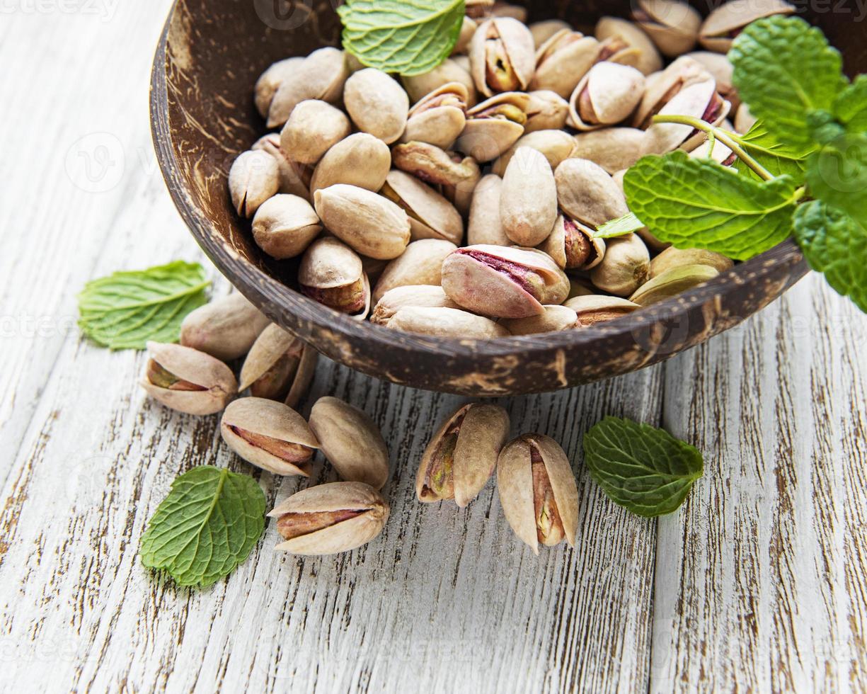 Bowl with pistachios photo