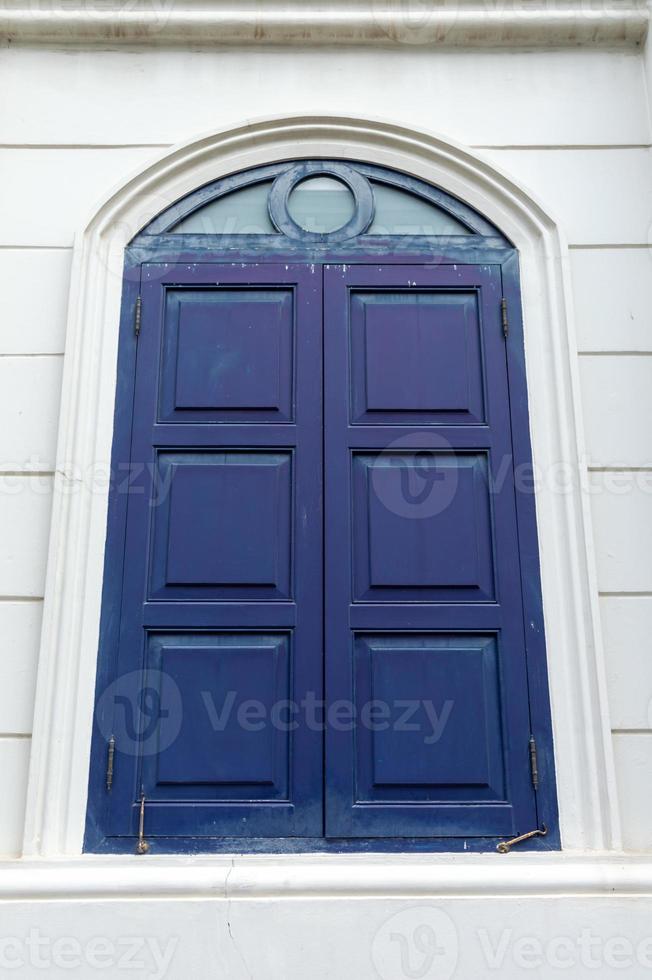 Large wooden window doors neoclassical architecture. photo