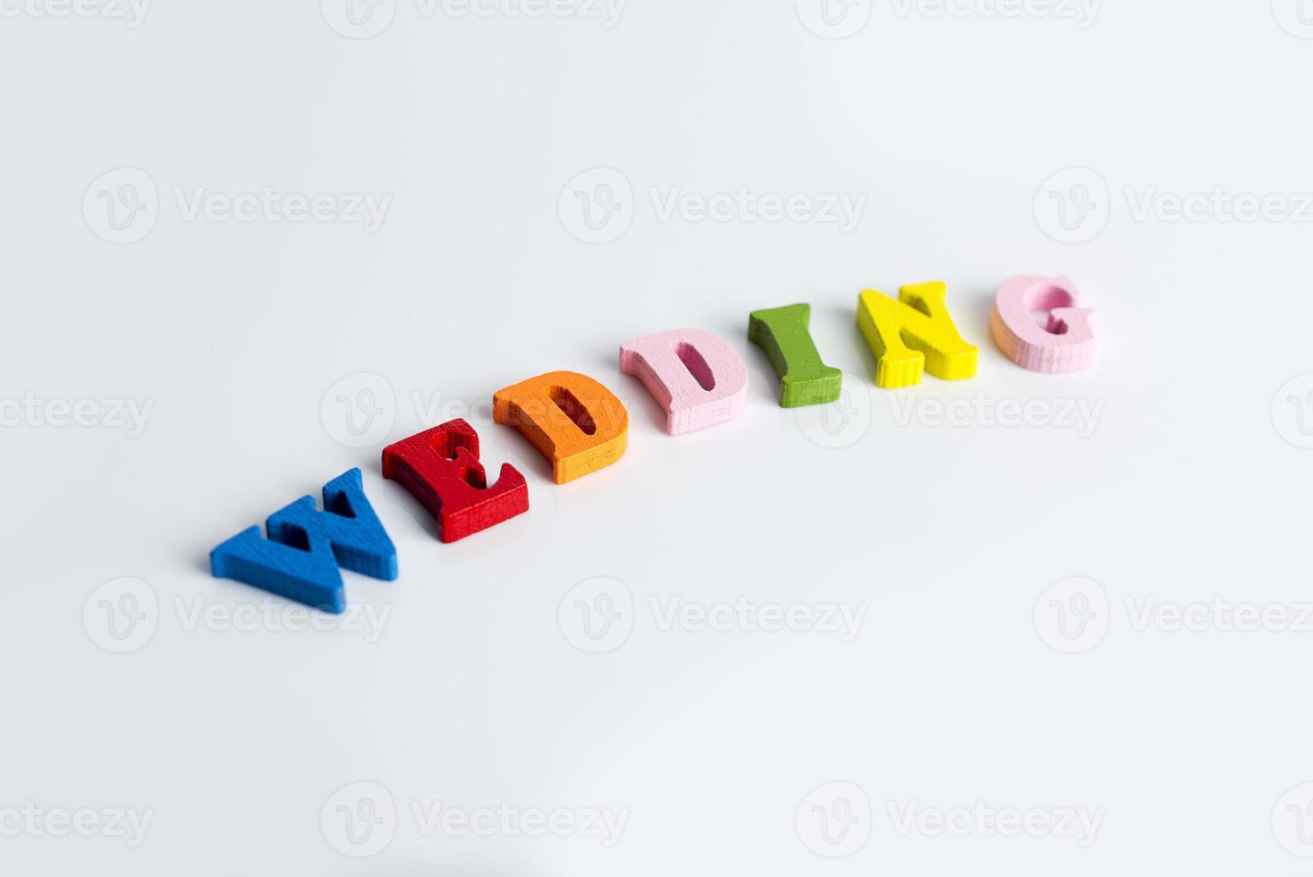 The word wedding on a white background. photo