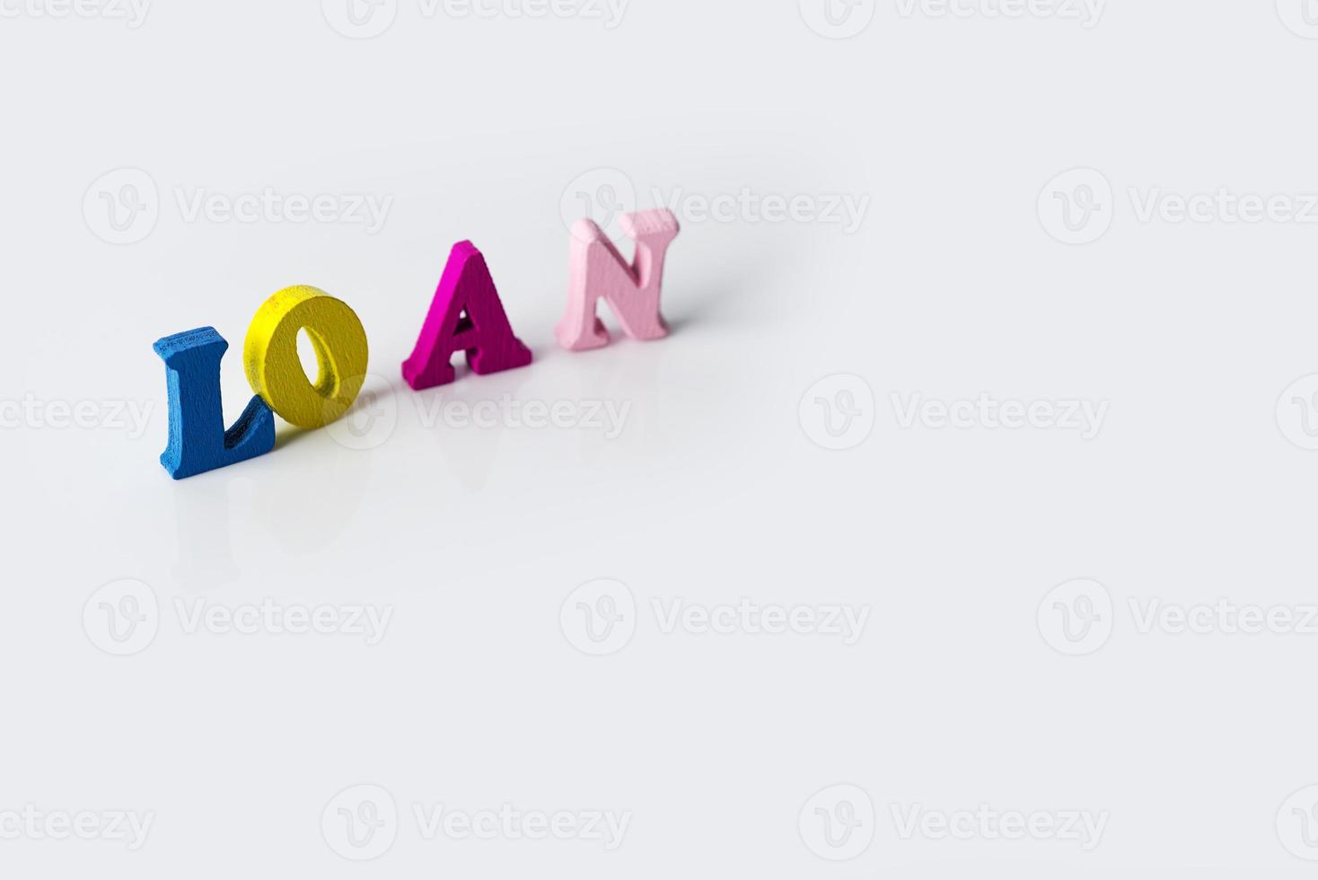 The word loan on white background. photo
