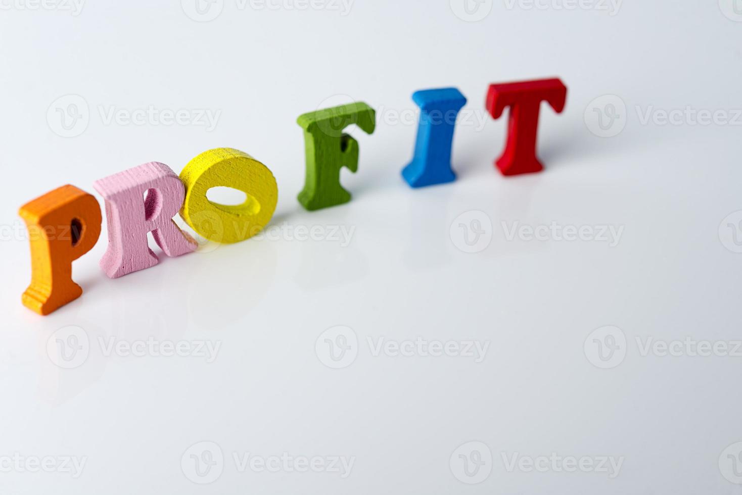 The word profit on white background. photo