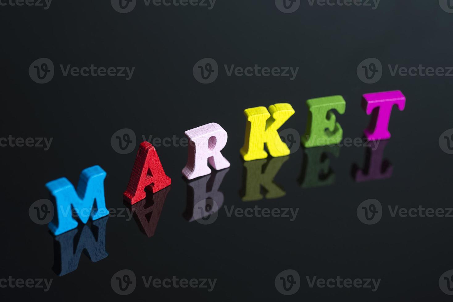 The word market on the black background. photo