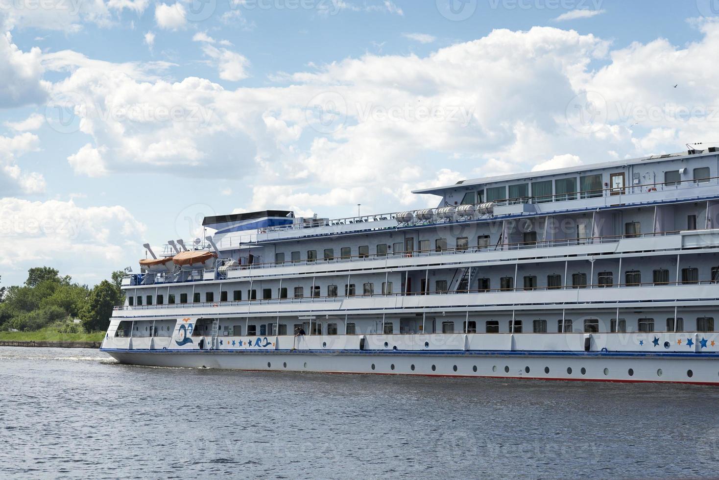 Passenger cruise ship goes down the river. photo