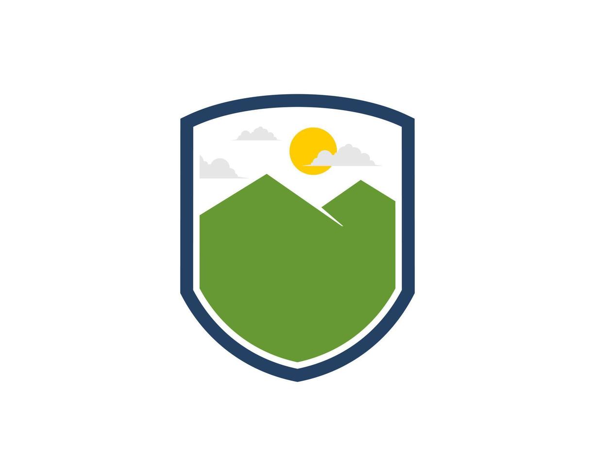 Shield with green mountain inside vector