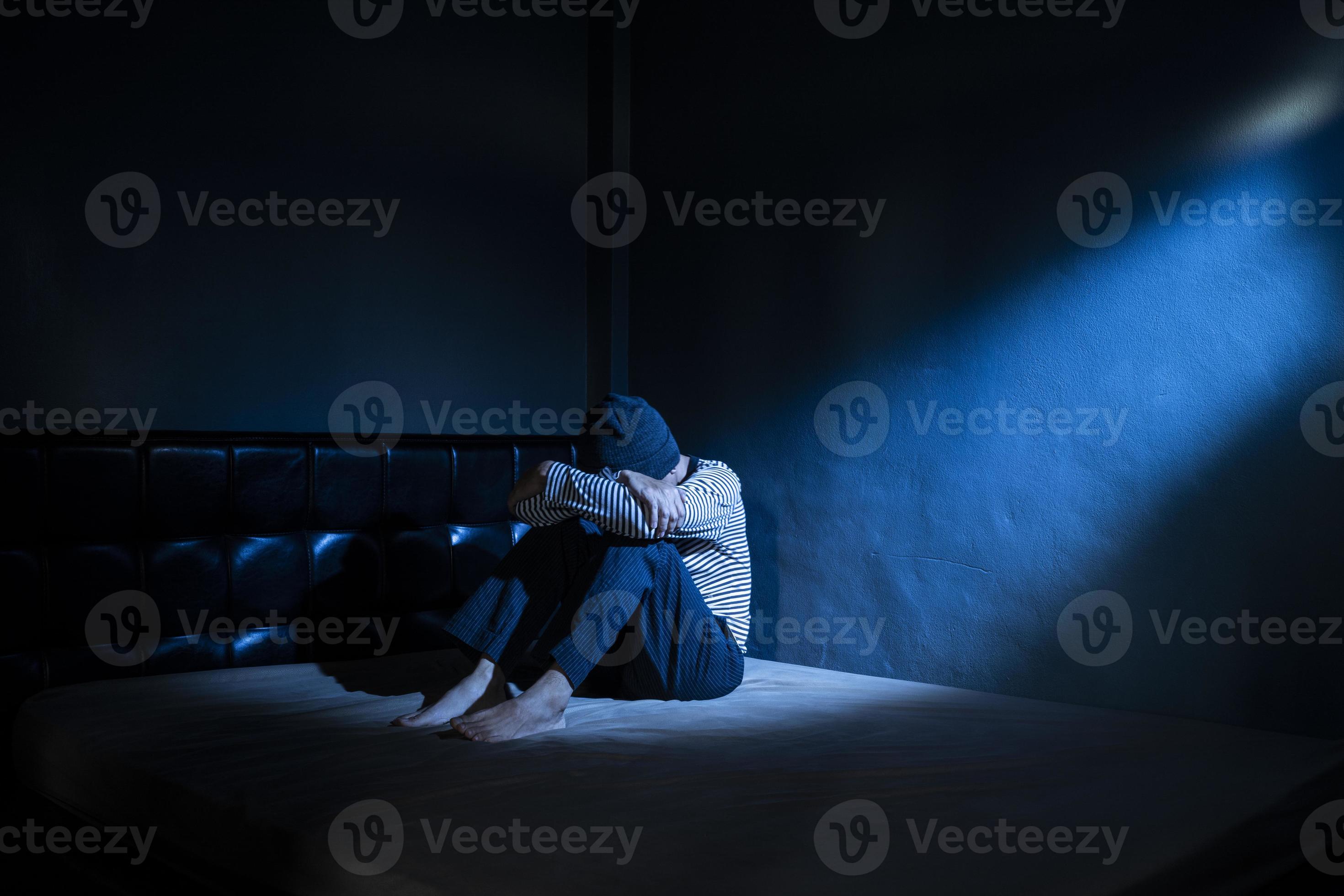 sad man in the dark room 4999552 Stock Photo at Vecteezy