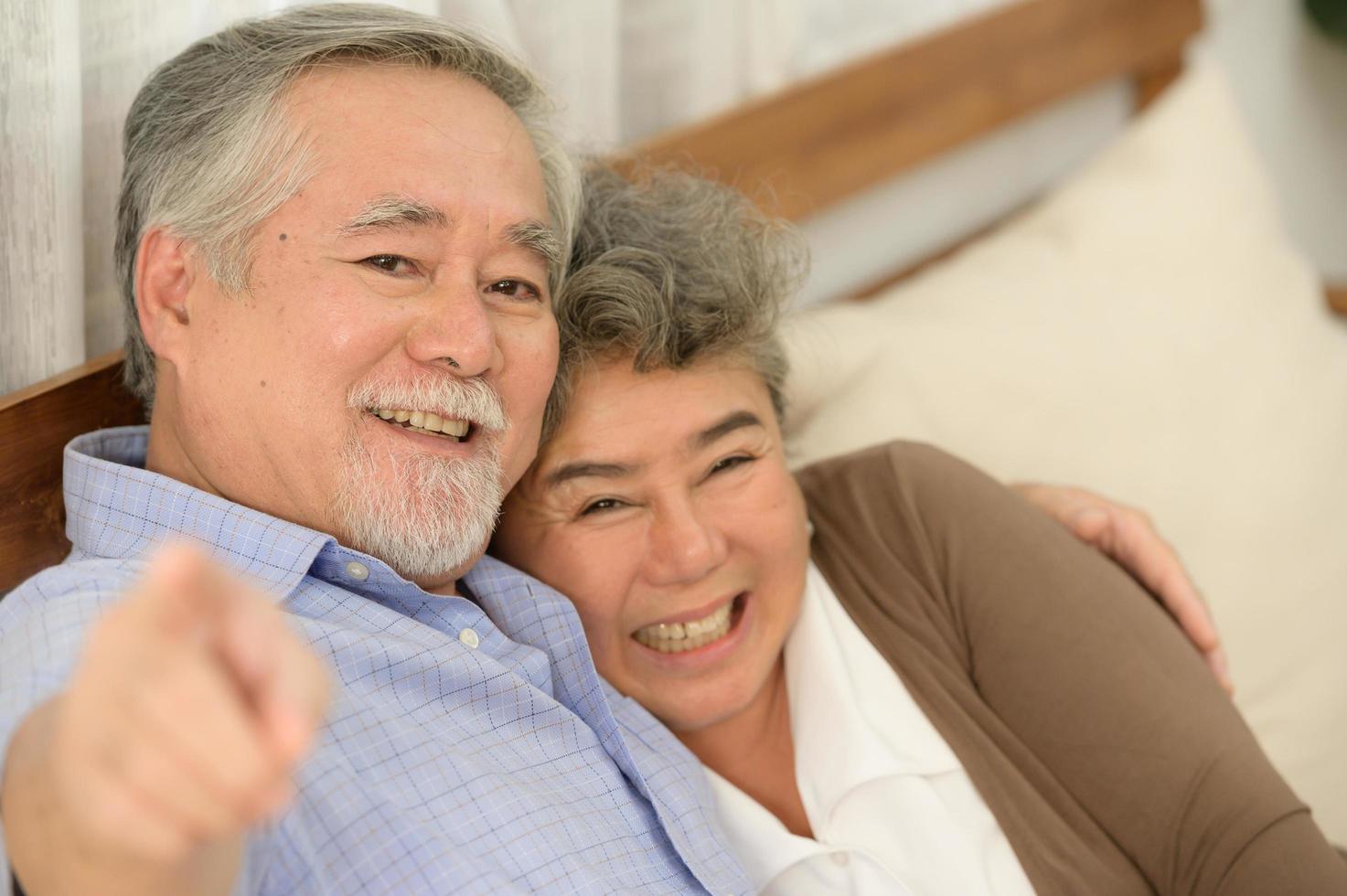 Senior couples who live happily together pay attention to each other without having children and grandchildren to look after. photo