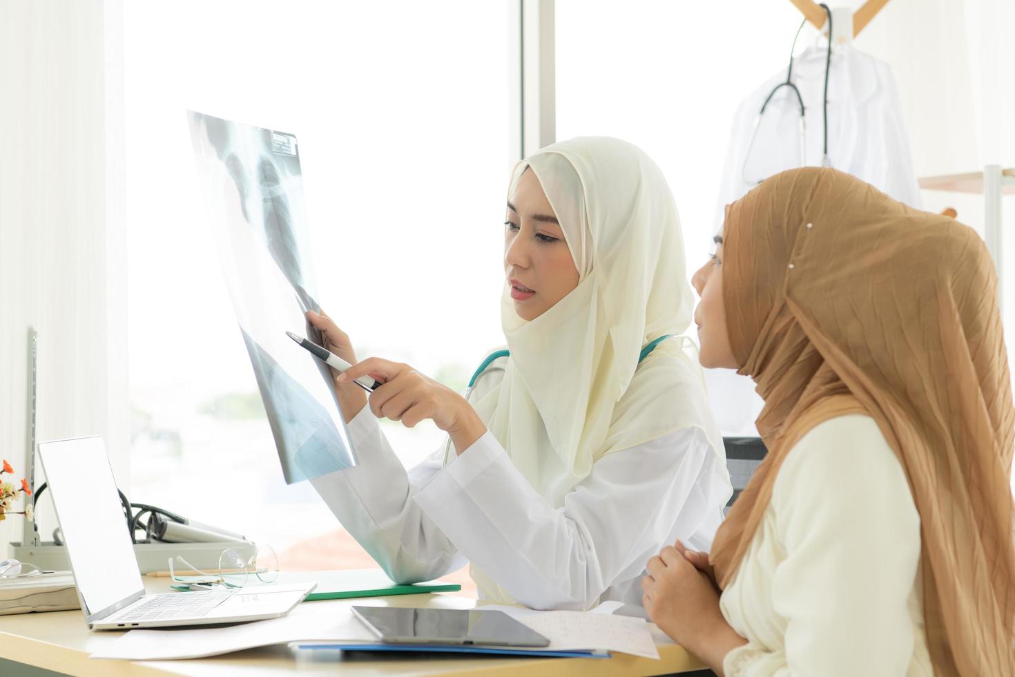 Muslim doctors were smiling and happy in providing medical services photo