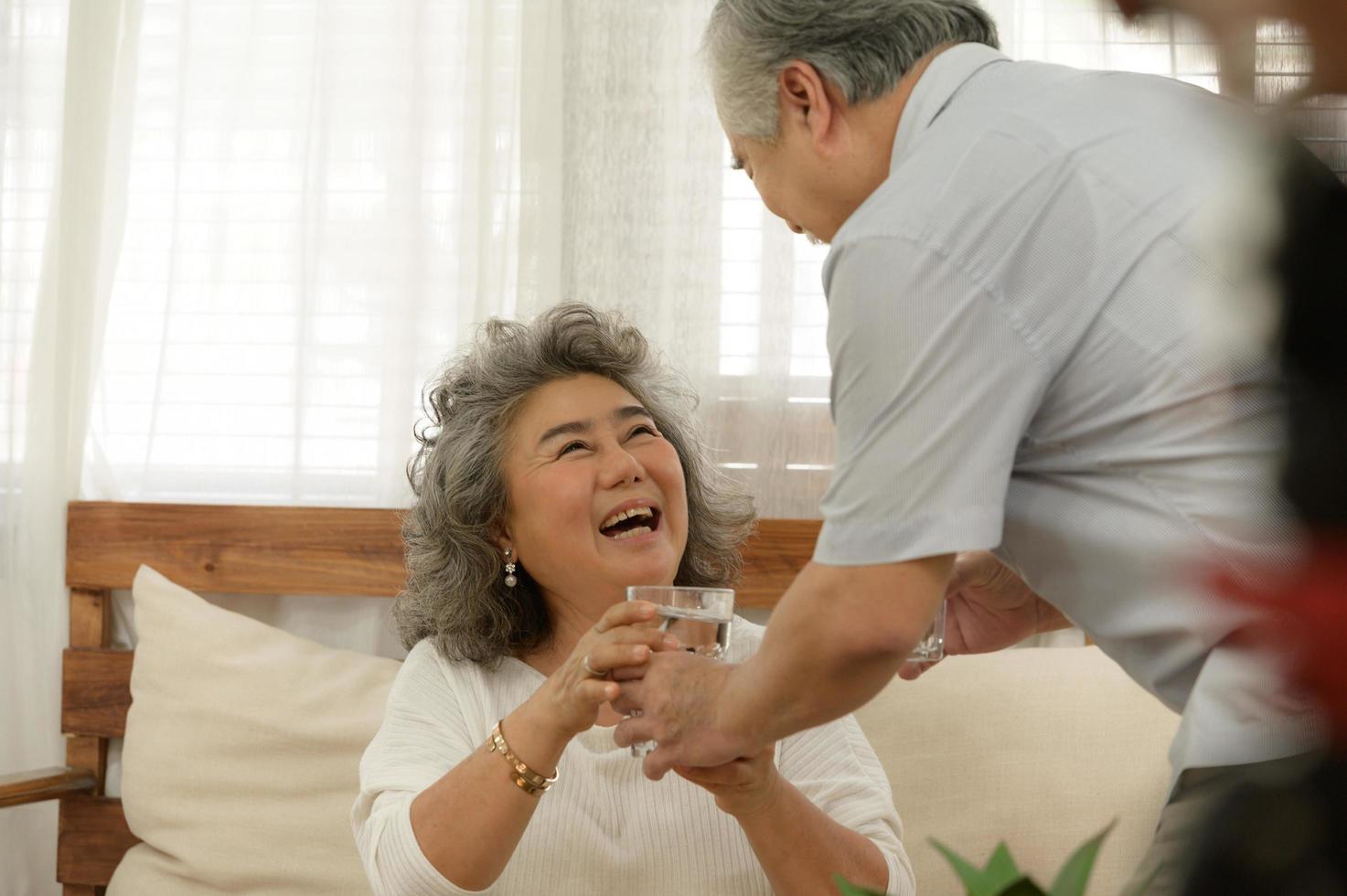 Senior couples who live happily together pay attention to each other without having children and grandchildren to look after. photo