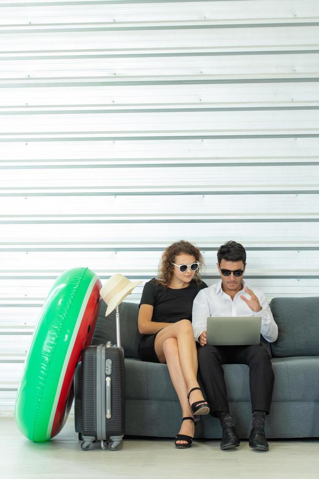 Two office workers searching for tourist attractions photo