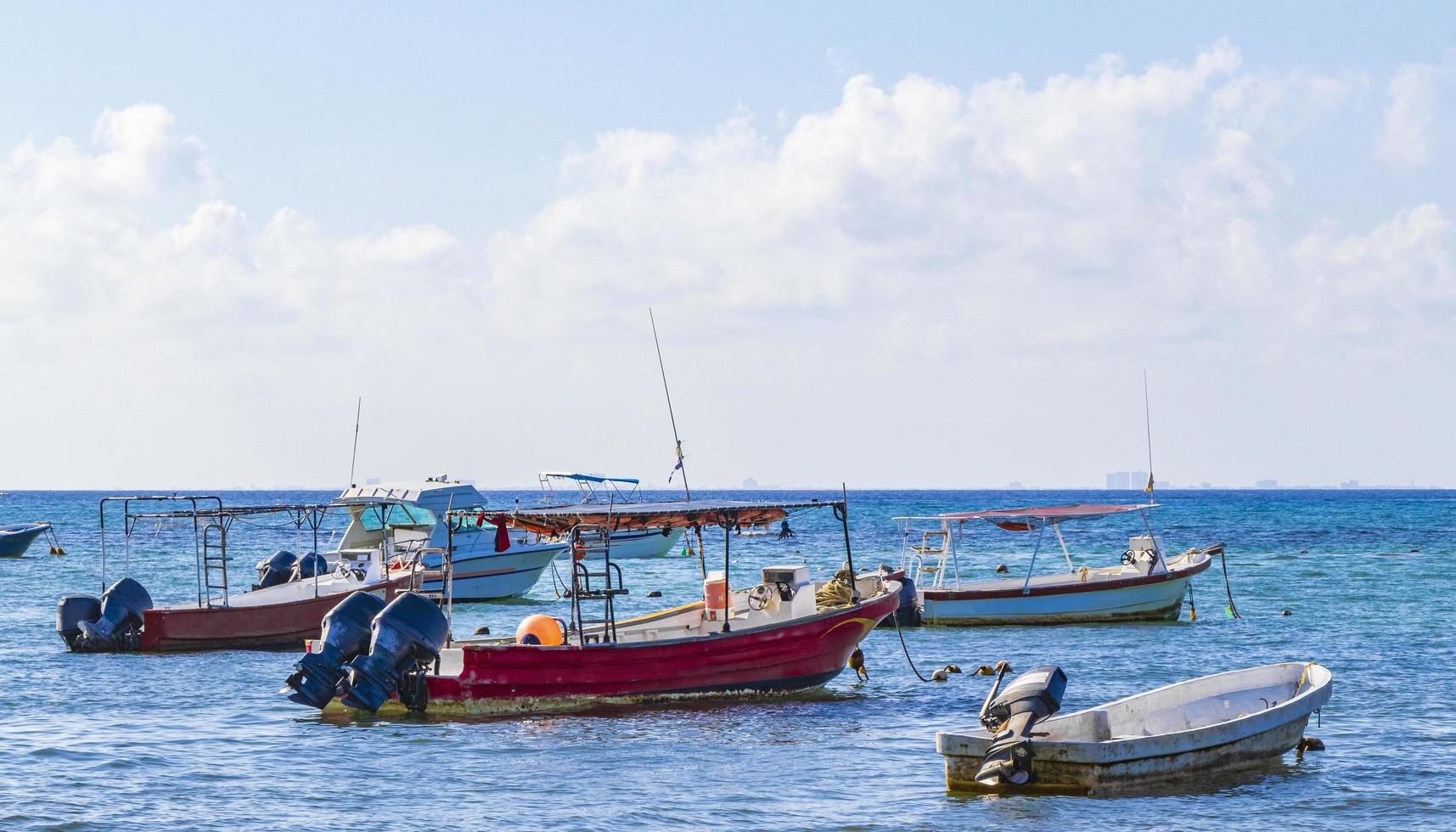 Boats yachts at Tropical mexican beach Playa del Carmen Mexico. photo