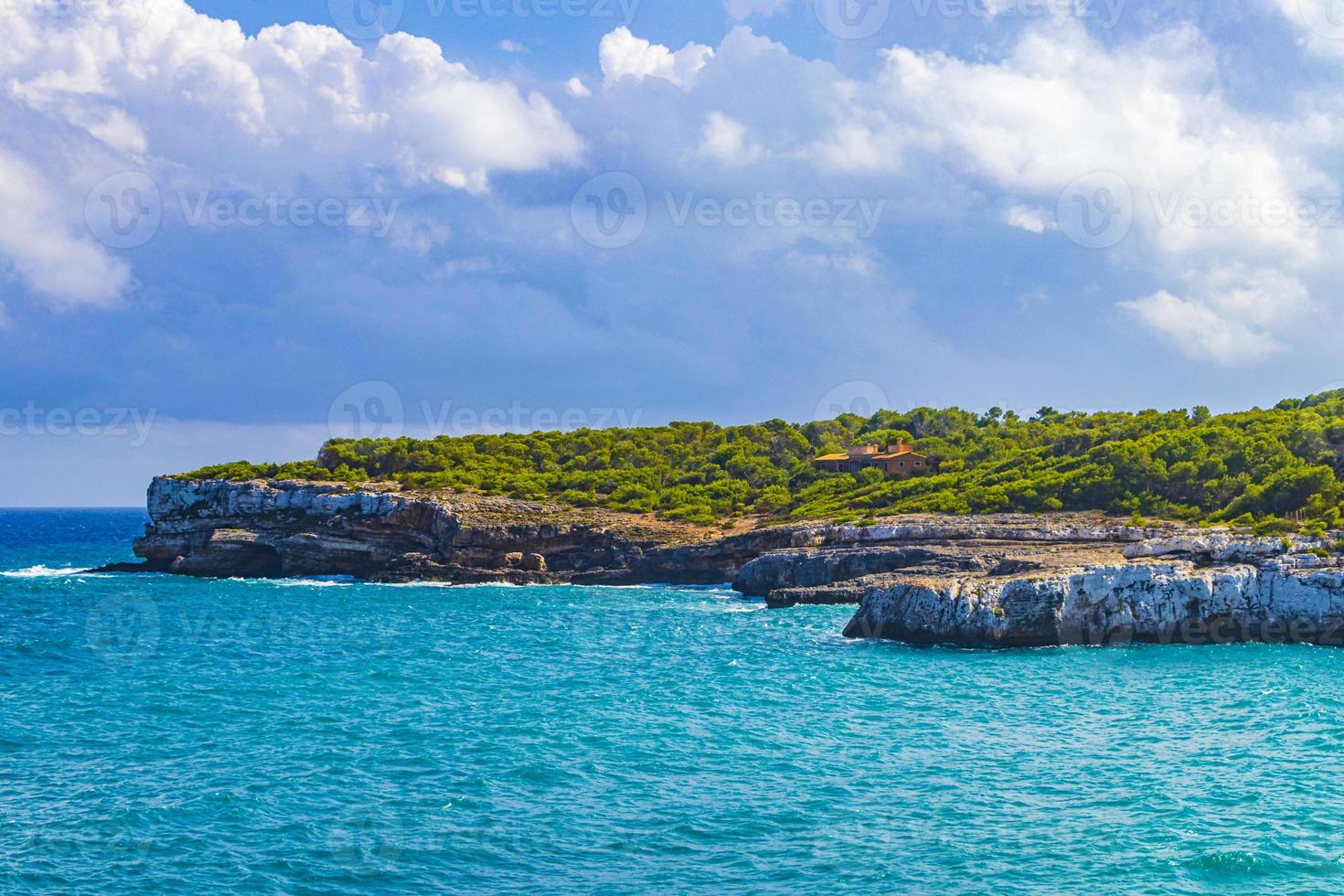 Panorama cliffs bay Cala Mondrago Mallorca Balearic Islands Spain. photo