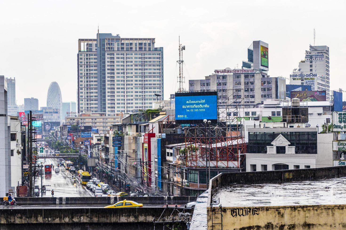 Bangkok Thailand 22. May 2018 Cityscape rain and heavy traffic in Ratchthewi Bangkok Thailand. photo